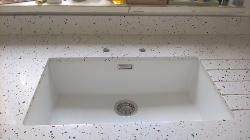 The composite form of terrazzo makes it sturdy and durable. Plus, its smooth, sleek and sealed finish makes it easy to clean and highly resistant to staining. Therefore, this worktop material is considered perfect for busy kitchens.